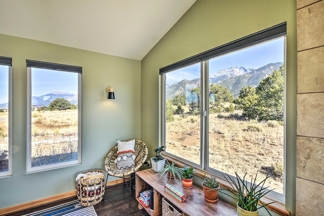 Snow-capped Sangre de Cristo peaks through the living room windows