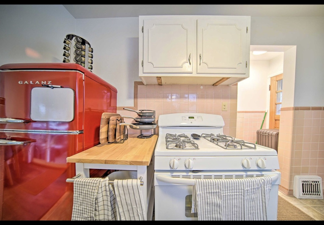 Kitchen with gas range and generous counter space